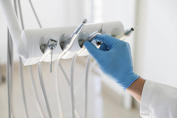 Professional Tooth Extraction technician working in Celina, TX